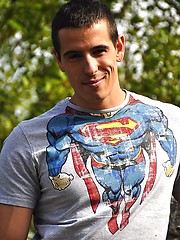 Beefy european jock showing his strong muscles