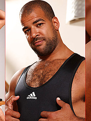 Hairy arabian athlete in tight sport suite