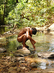 Young latino boy Juanito jerking in the jungle