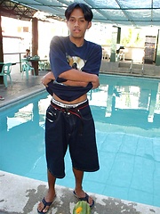 Thai twink plays with fruit