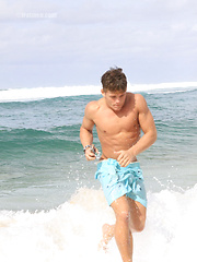 Sexy beach jock playing outdoors and in a room