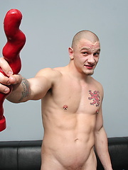 Bobby plays with his huge anal toys